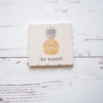 CounterArt and Highland Home Be Sweet Pineapple coaster against a white backdrop