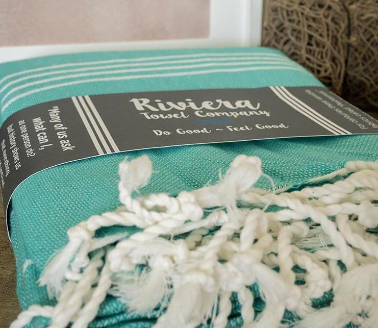 Closeup of a sea green Turkish Essewntial blanket by Riviera Towel Company