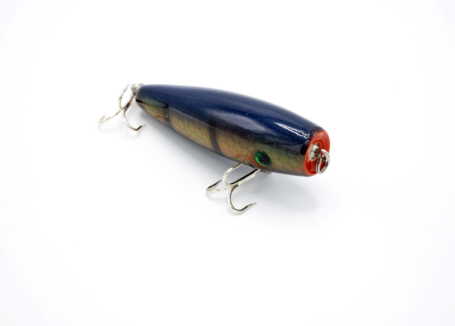 Upright view of the Blue and brown with red netting stiped pattern fishing lure by JL Lures