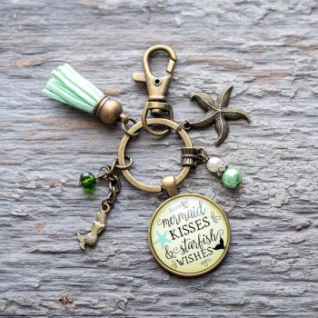 Mermaid kisses keychain by Gutsy Goodness on a rustic piece of wood