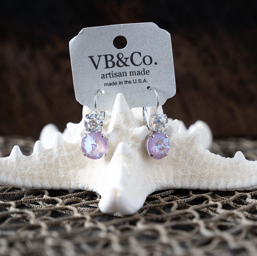Front view of the pink Swarovski earrings by VB&CO on a starfish