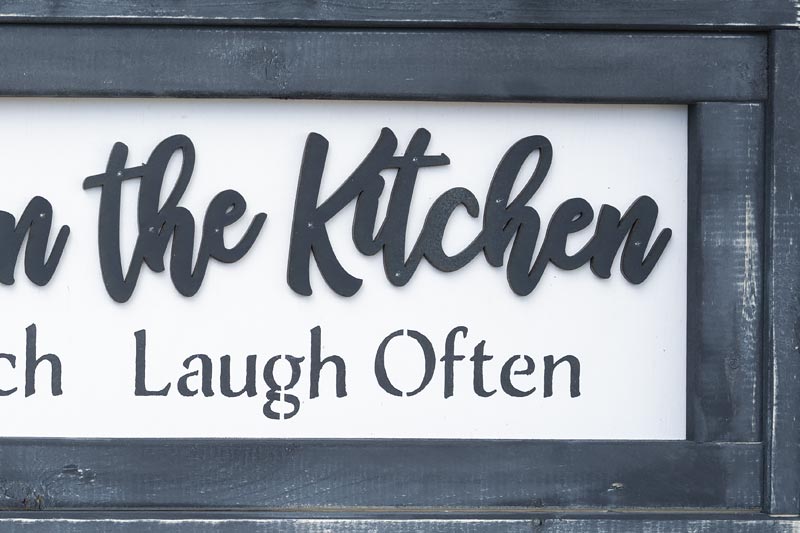 Closeup View of the Handmade Wooden Come Gather in the Kitchen Sign by Pine Designs