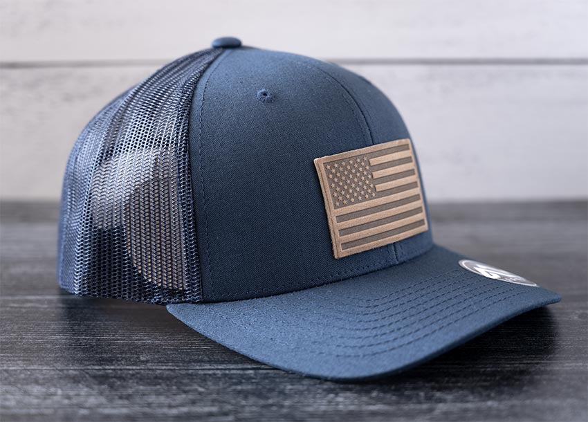 Angled View of the RANGE Leather American Flag Leather Patch Hat in Navy