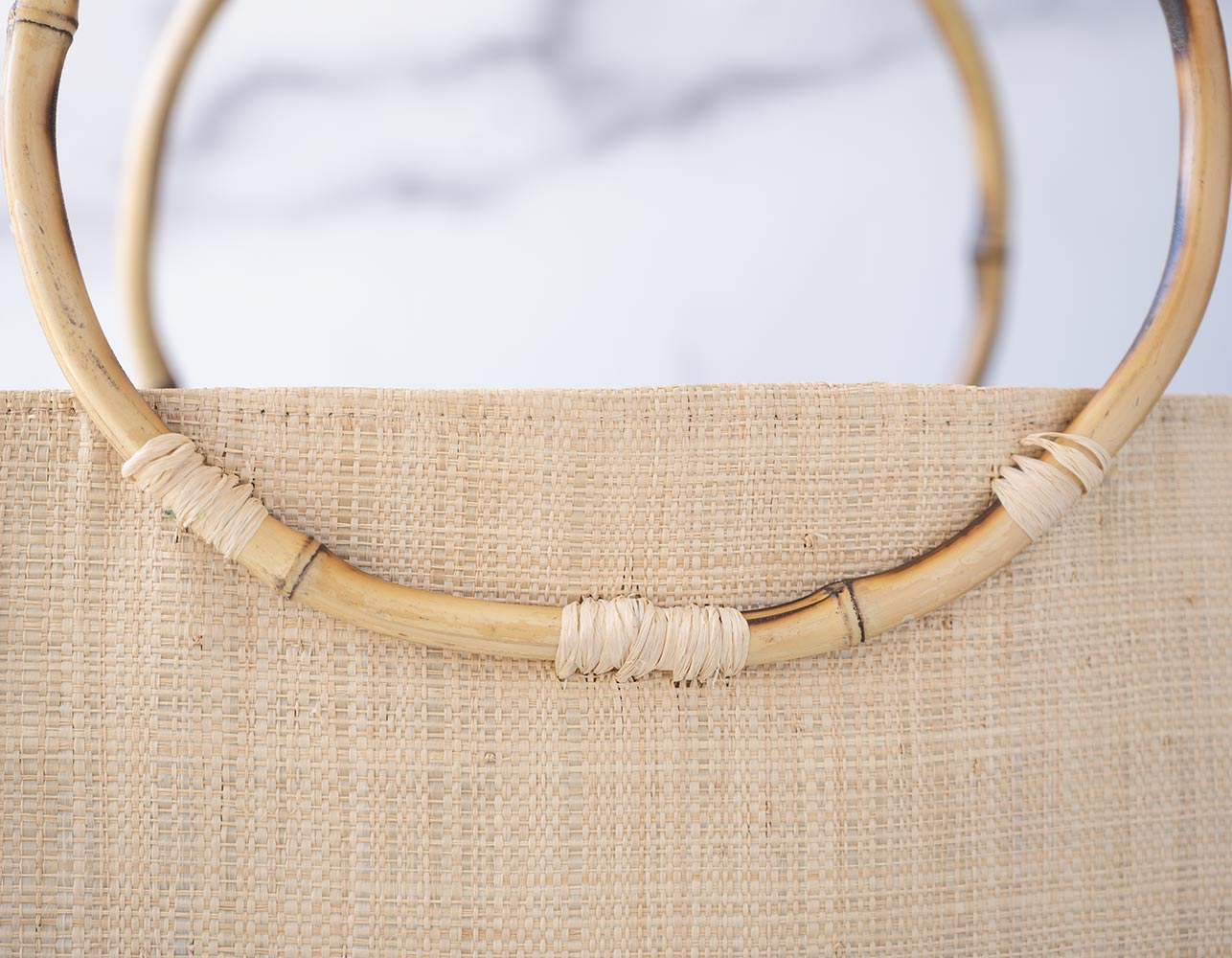 Top View of the Shebobo Bebe Straw Bag with Bamboo Handles