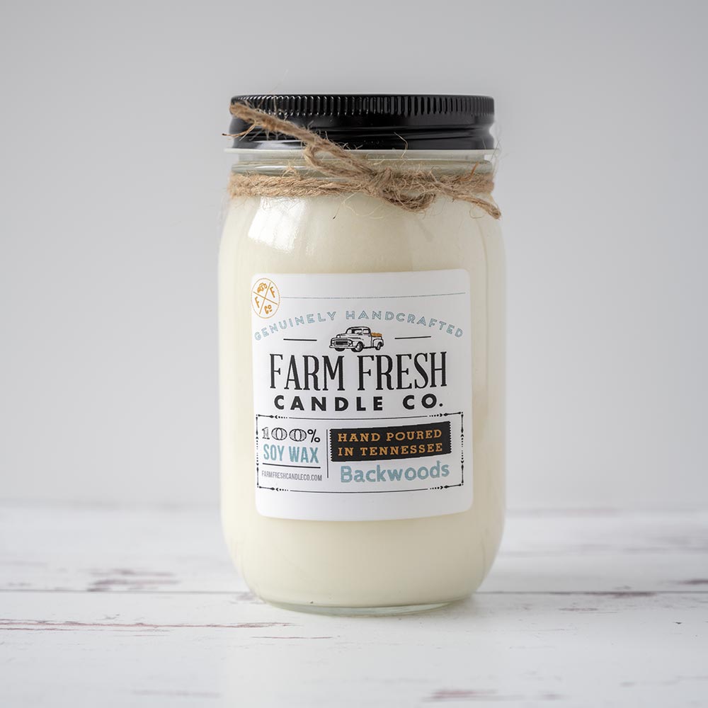 Farm Fresh Candle Backwoods Soy candle on rustic wood top
