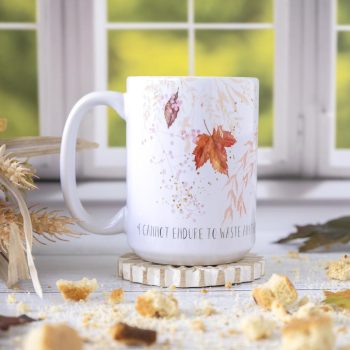 Right view of the Foliage Fall mug by Florae & Snow against a Fall window with biscotti pieces