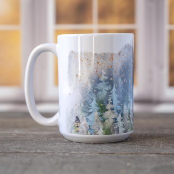 Right view of the Loveland Forest mug against a window backdrop and on top of a wood surface