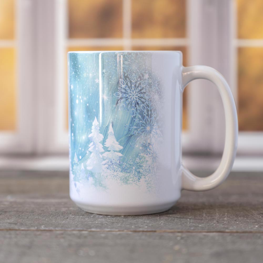 Right view of the Snow & Ice Winter mug against a window backdrop and on top of a wood surface