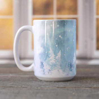 Left view of the Snow & Ice Winter mug against a window backdrop and on top of a wood surface