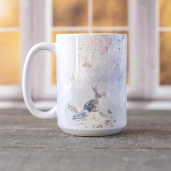 Right view of the Swan lake mug by Florae & Snow on a wooden top with window backdrop