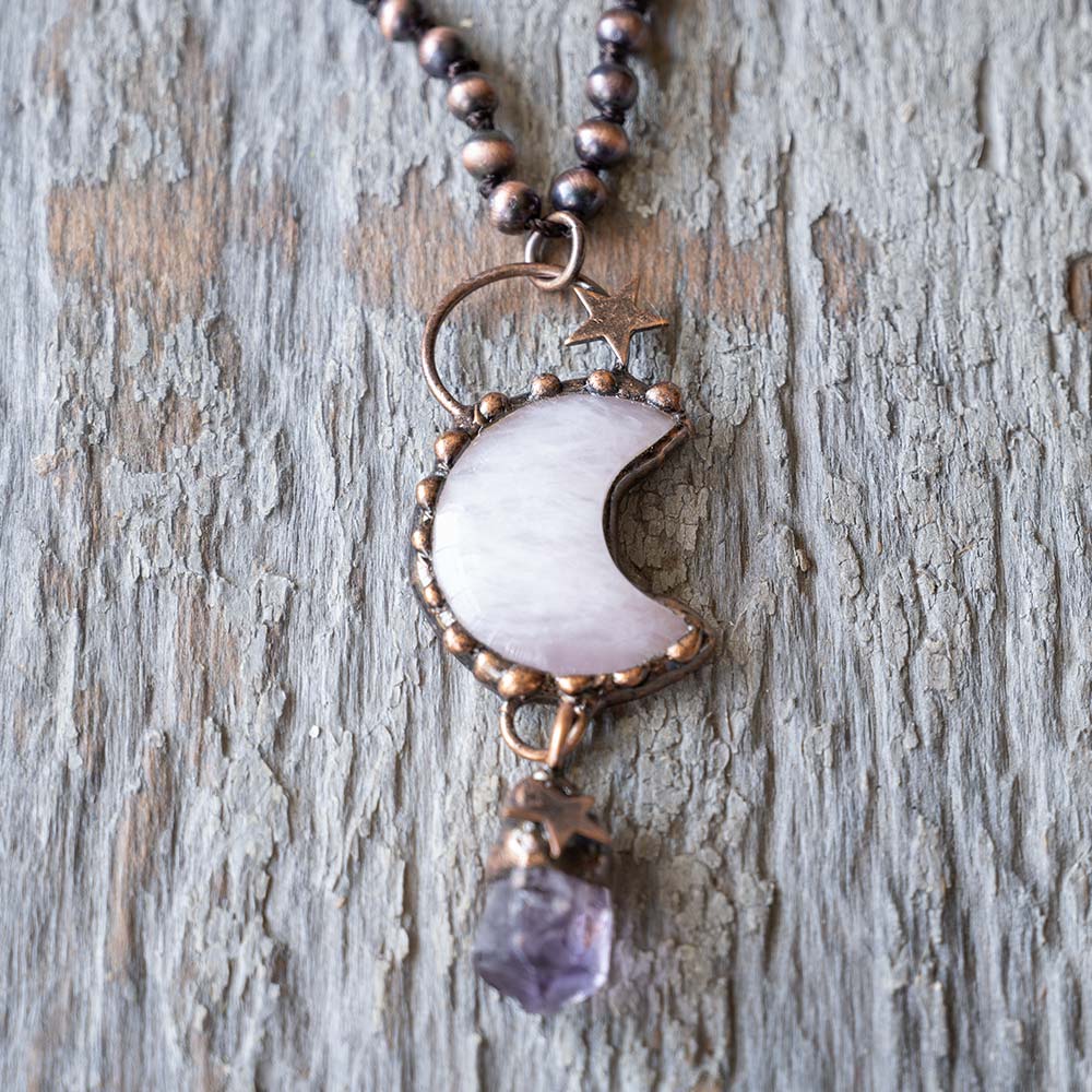 Front View of the Luna Moon Boho Necklace Moon Charm by VB& CO Designs on Rustic Wood Backdrop