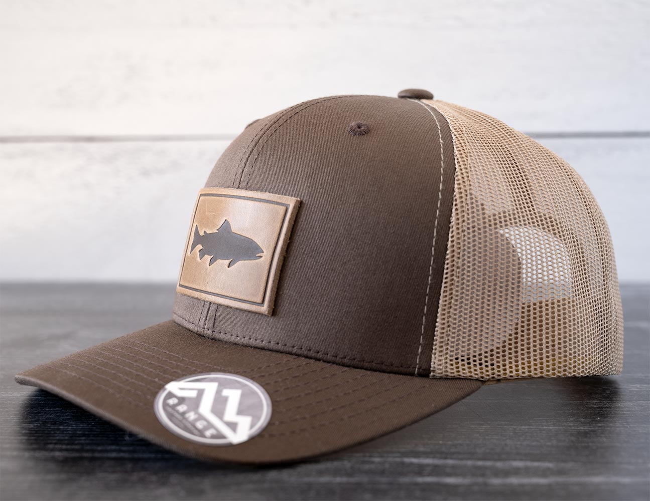 Right Angled View of the RANGE Leather Trout Hat in the Color Brown & Khaki