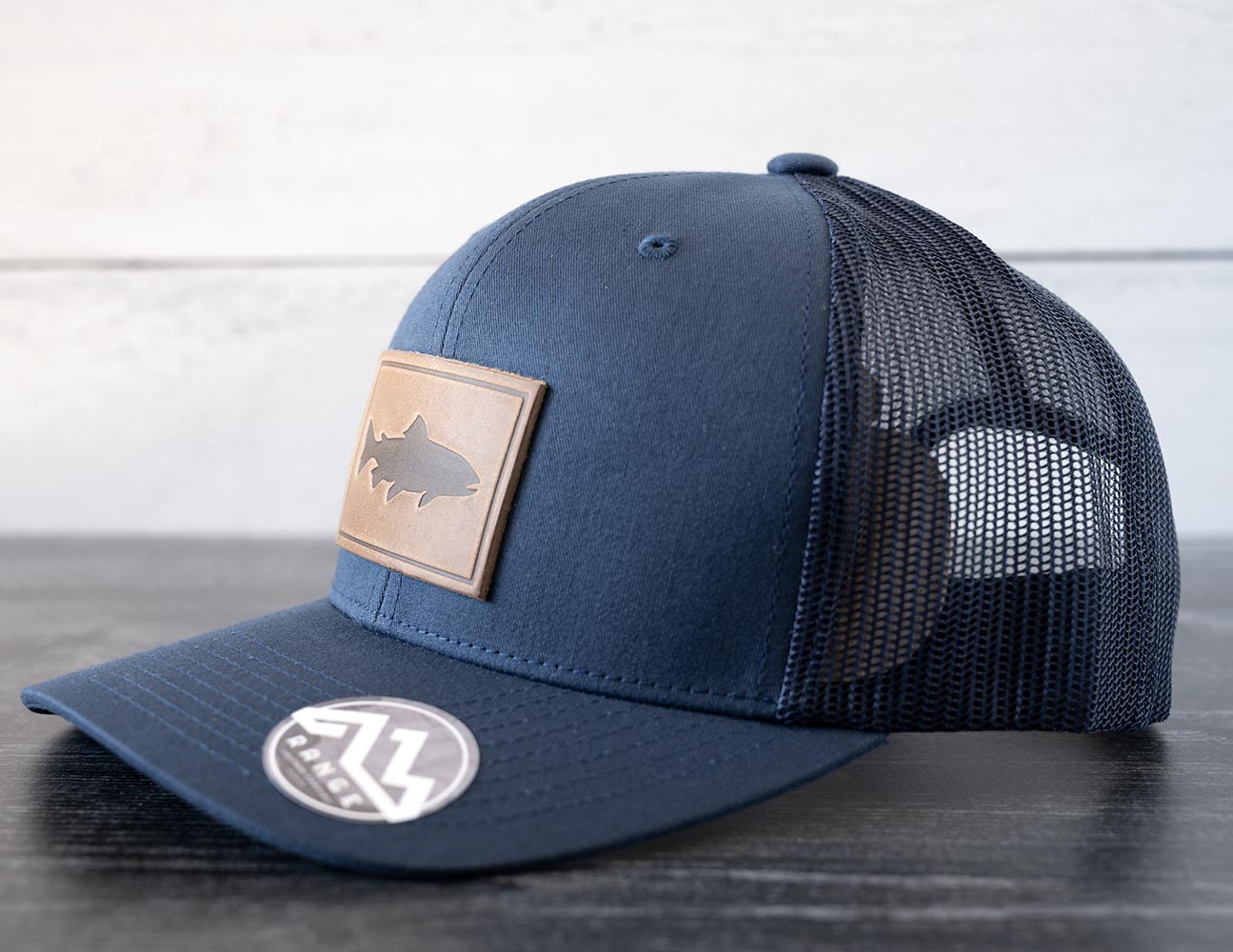 Right Angled View of the RANGE Leather Trout Hat in the Color Navy