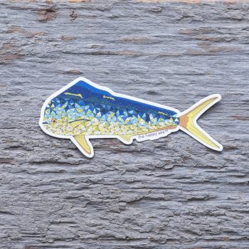 Top view of the Happy Sea Mahi sticker on a rustic wood background